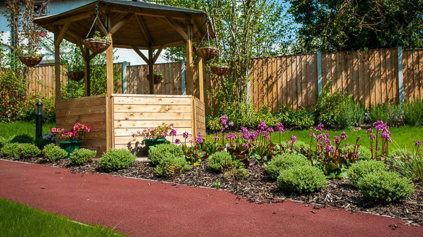 MHA Fulwood Court retirement living gardens and gazebo on a path