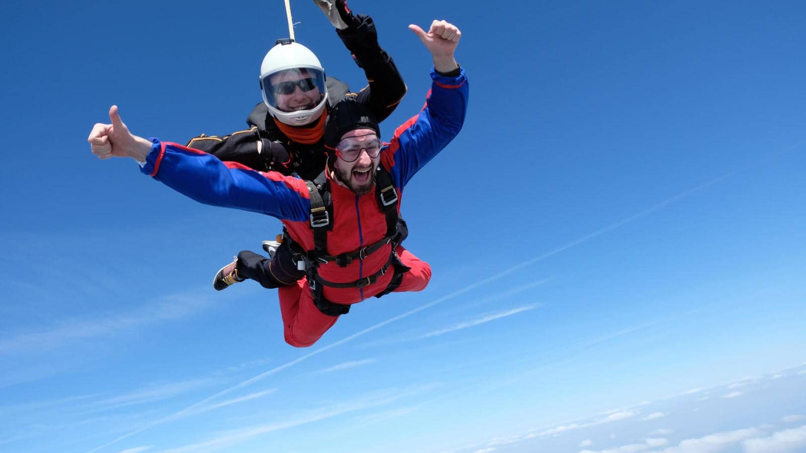 Two men tandem skydiving