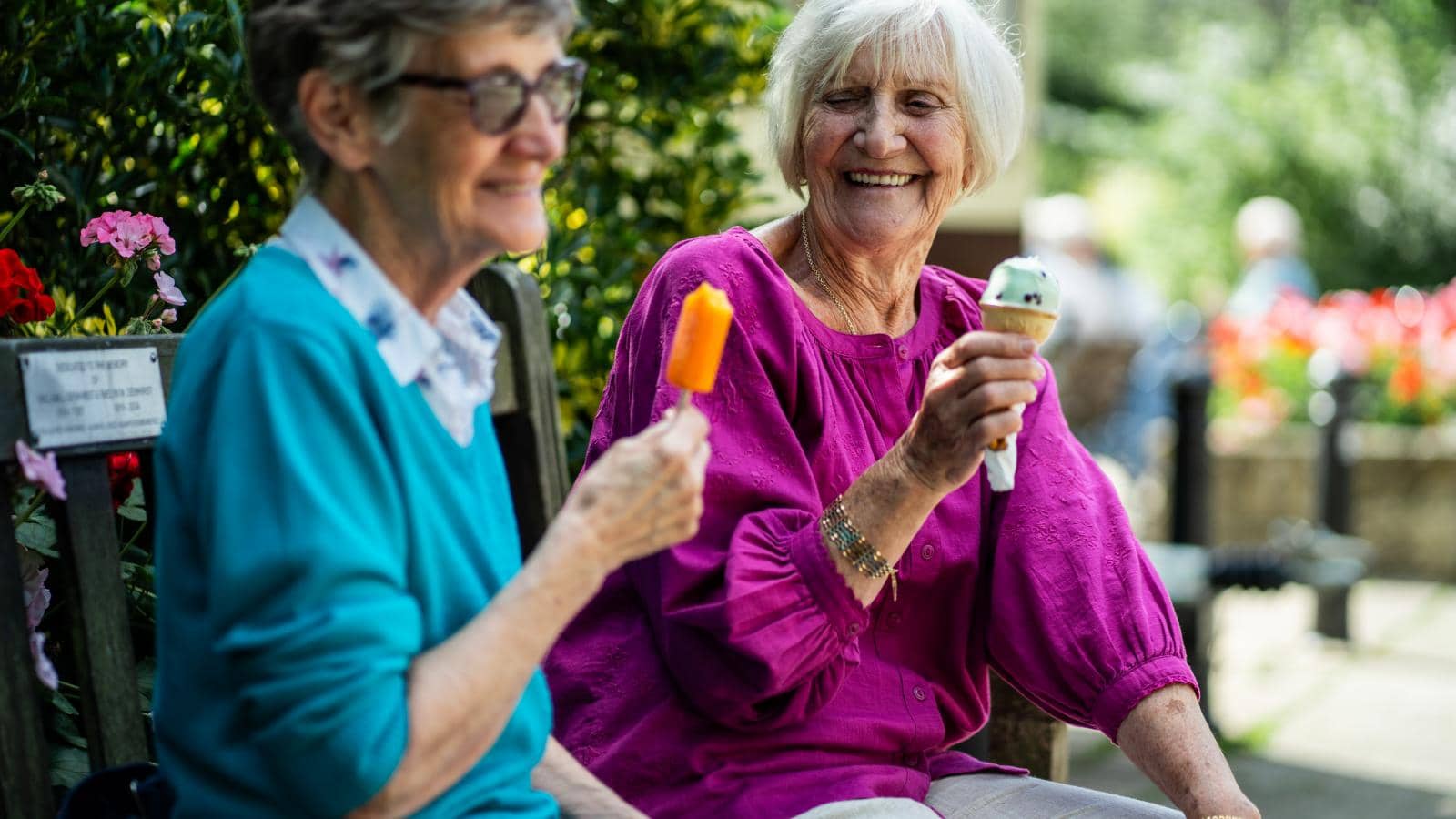 Joyful Seniors Enjoying Ice Cream on a Sunny Day