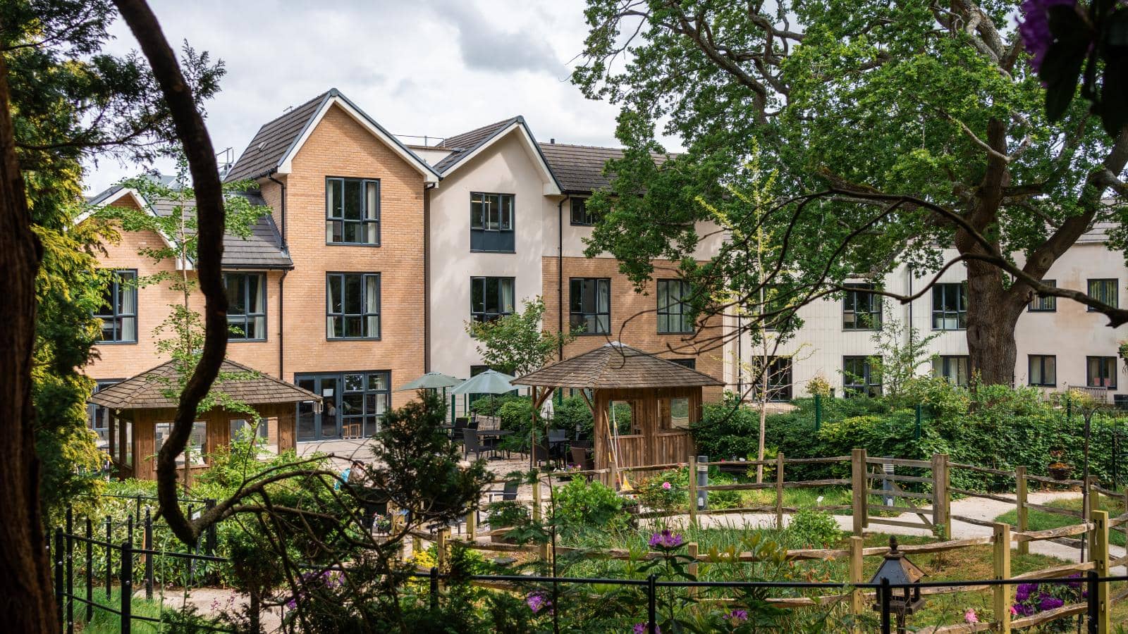 Hall Grange Care Home, surrounded by its extensive gardens