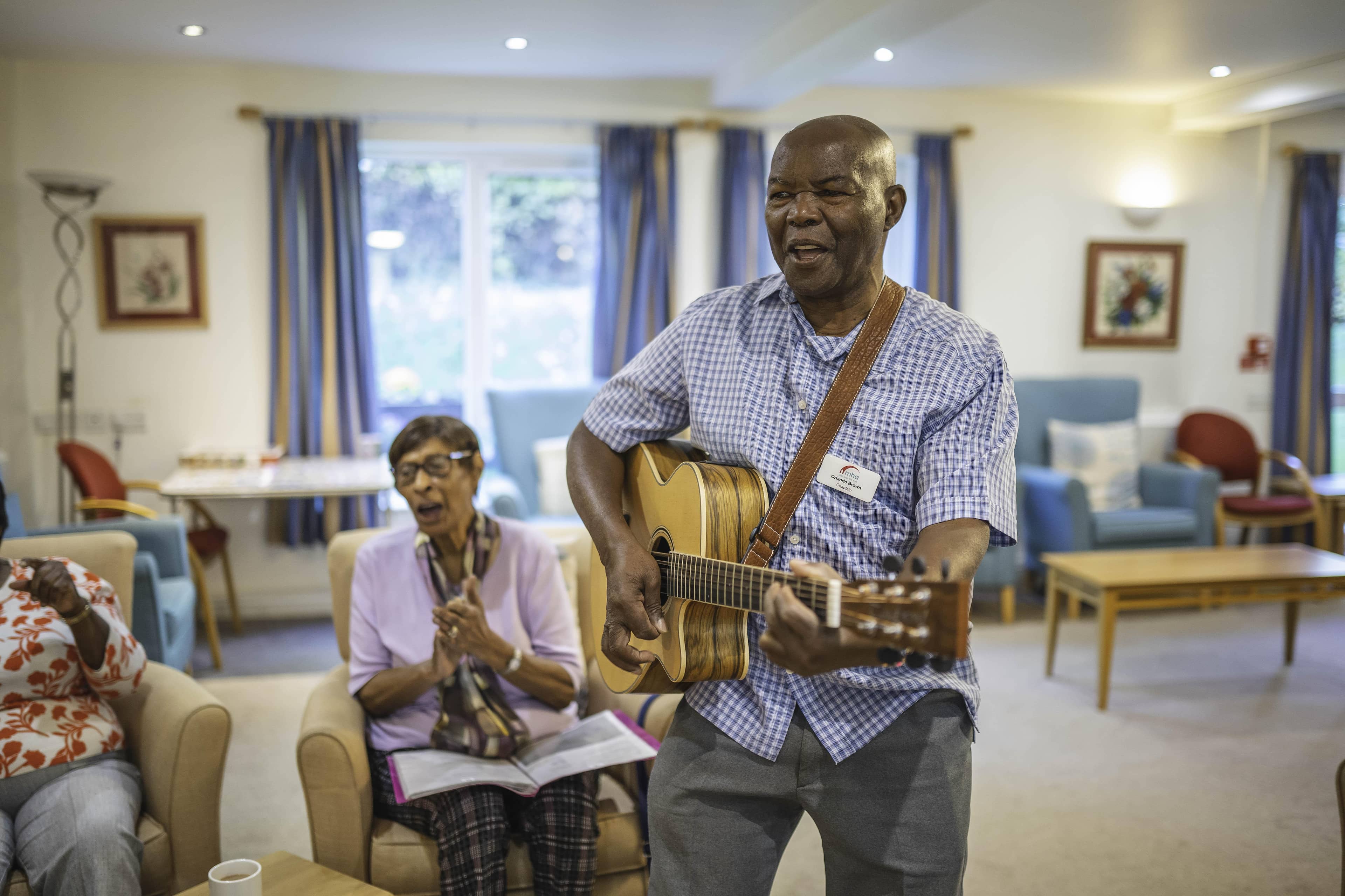 Bradley Court - residents singing session with chaplain