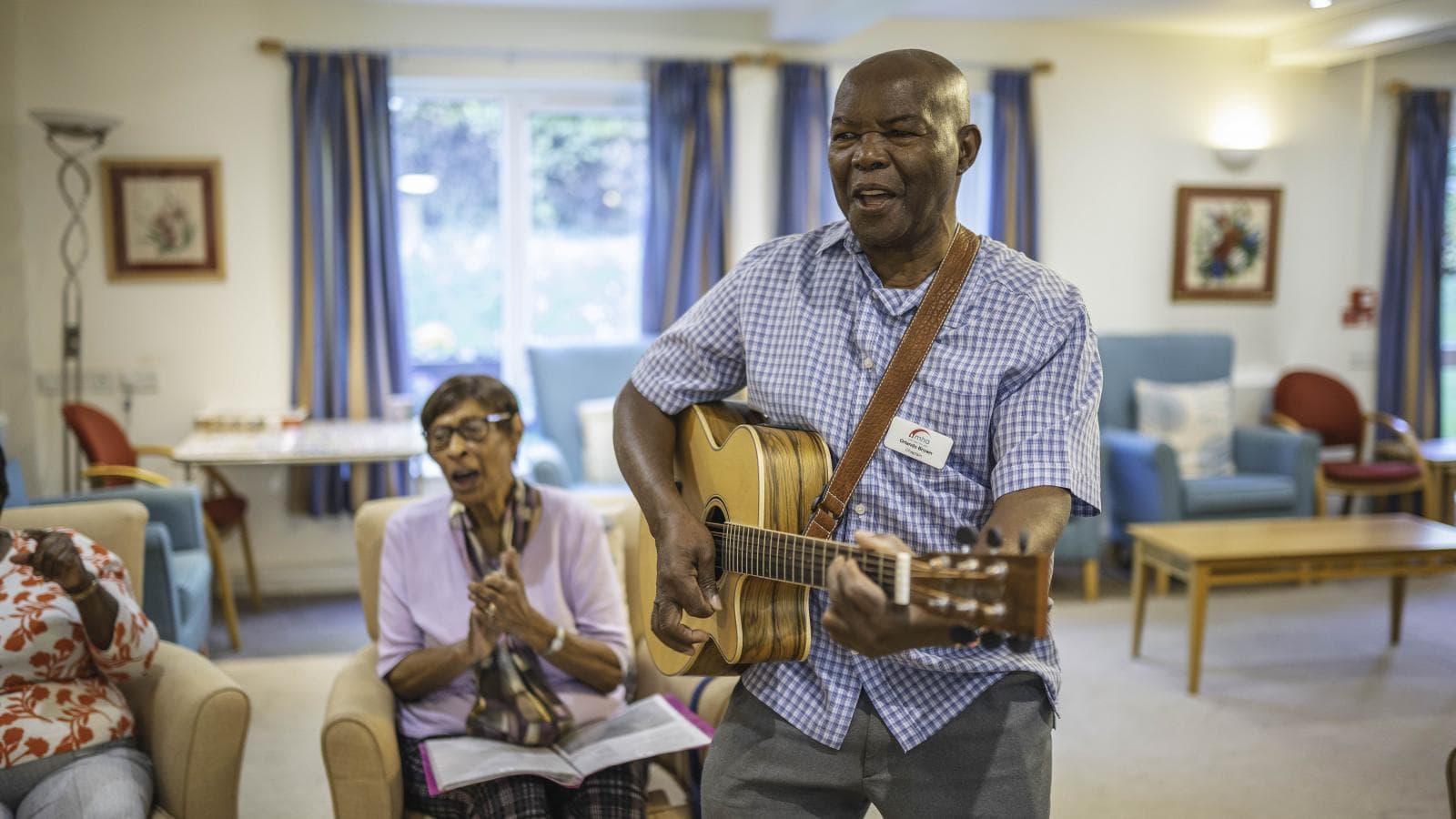Bradley Court - residents singing session with chaplain