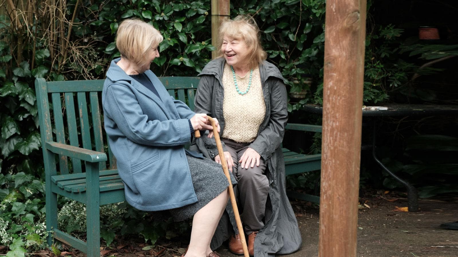 Two ladies enjoying retirement living in their garden