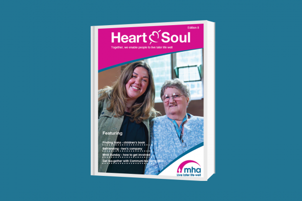 Heart & Soul edition 8 cover image featuring a young, female volunteer with an older woman, smiling.