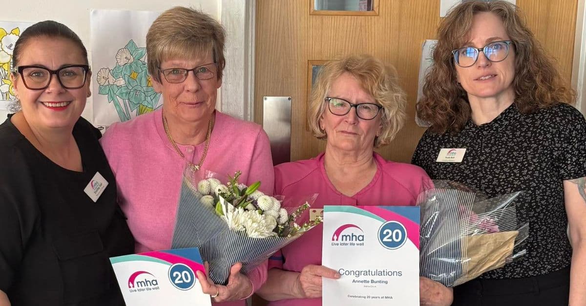 Staff members at MHA Edina Court mark combined work service of 40 years