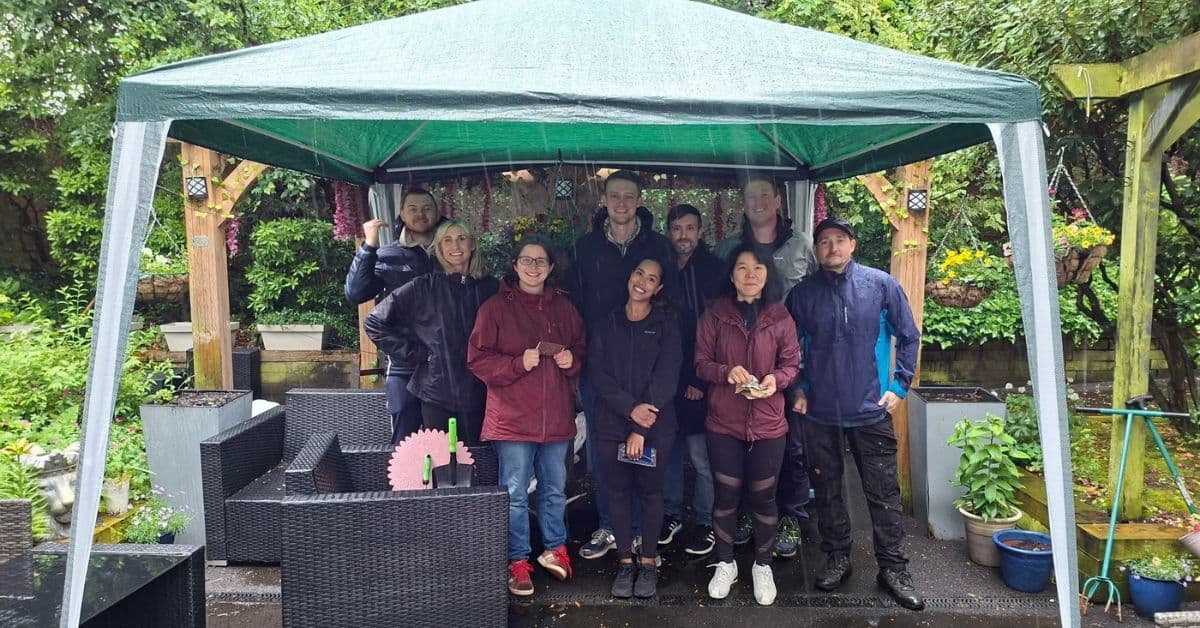 Colleagues from Manchester based insurance broker spend day at MHA Handsworth giving TLC to garden